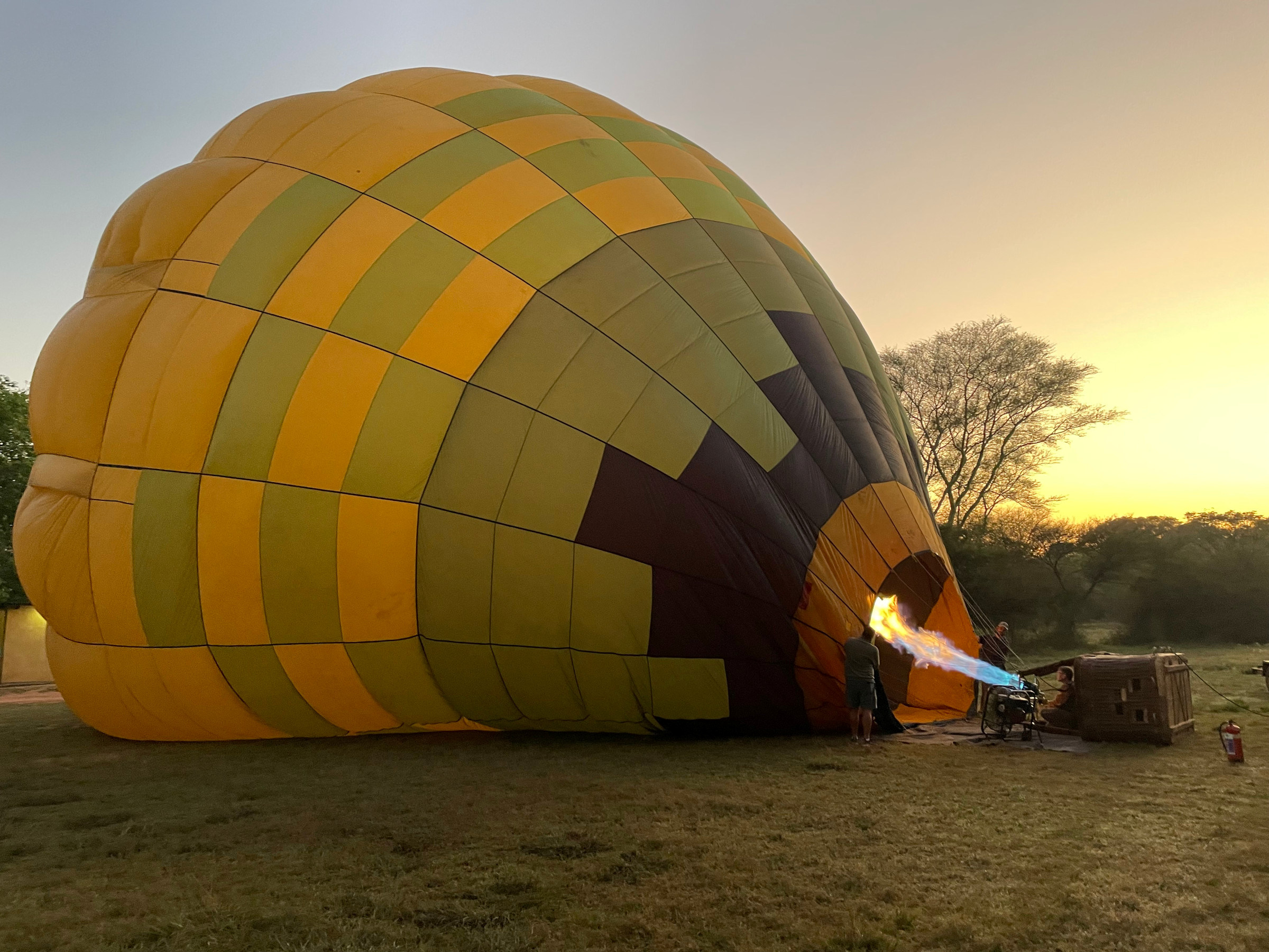 This image is of a Hot Air Balloon getting Hot Inflated before the flight.